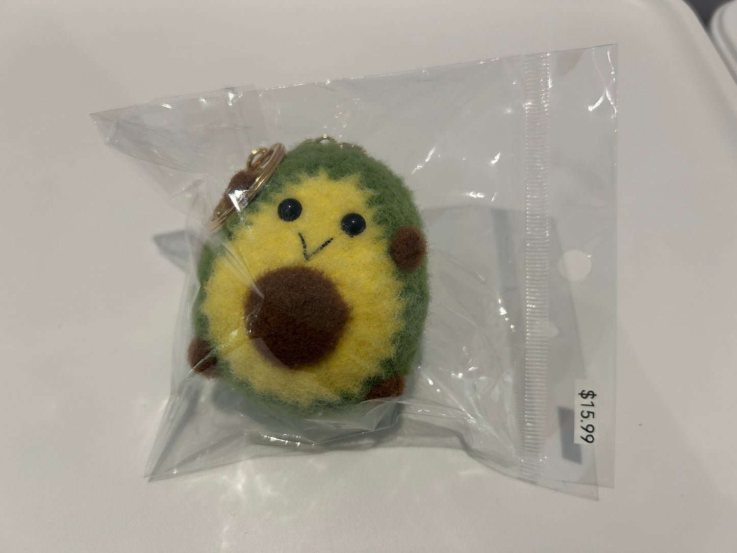 Handmade wool felt avocado keychain