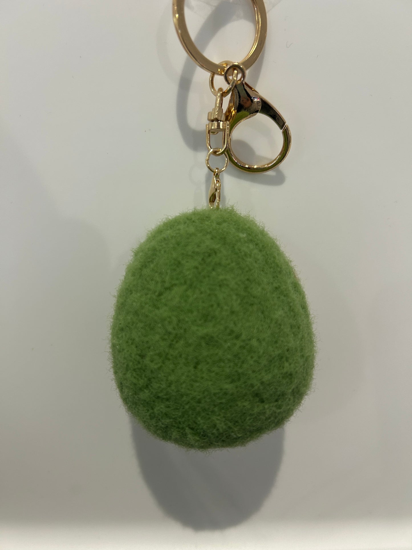 Handmade wool felt avocado keychain