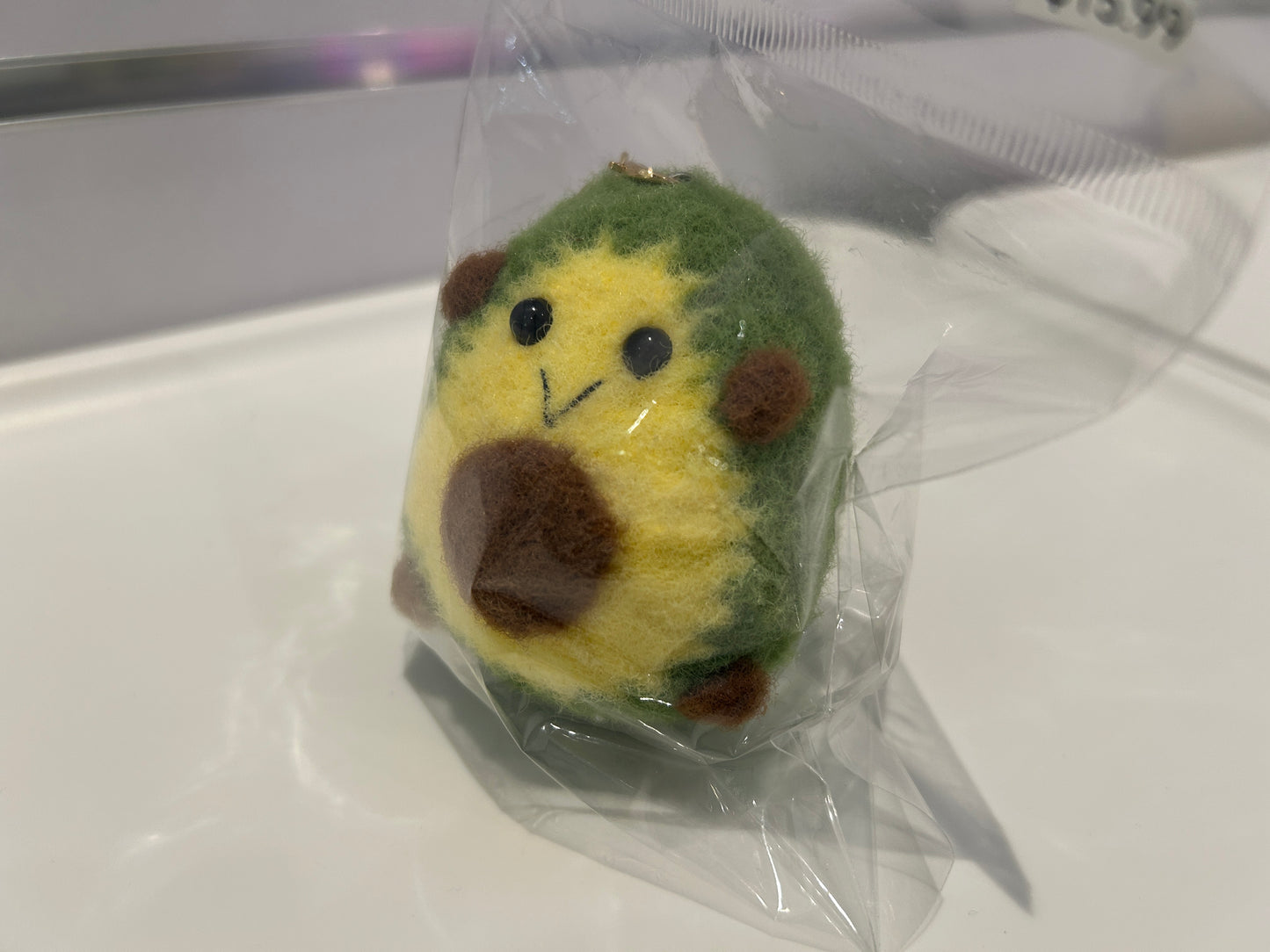 Handmade wool felt avocado keychain