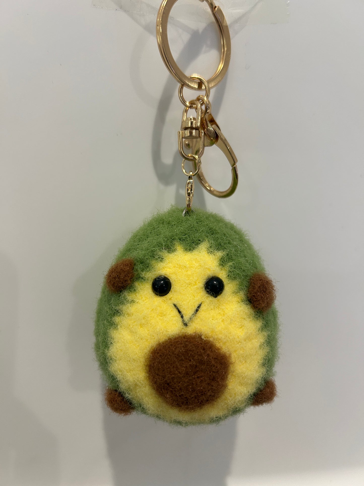 Handmade wool felt avocado keychain