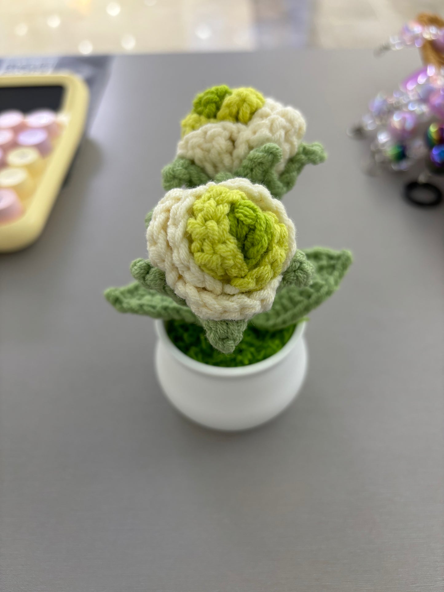 Hand-Crocheted Green and White Rosebuds in White Pot