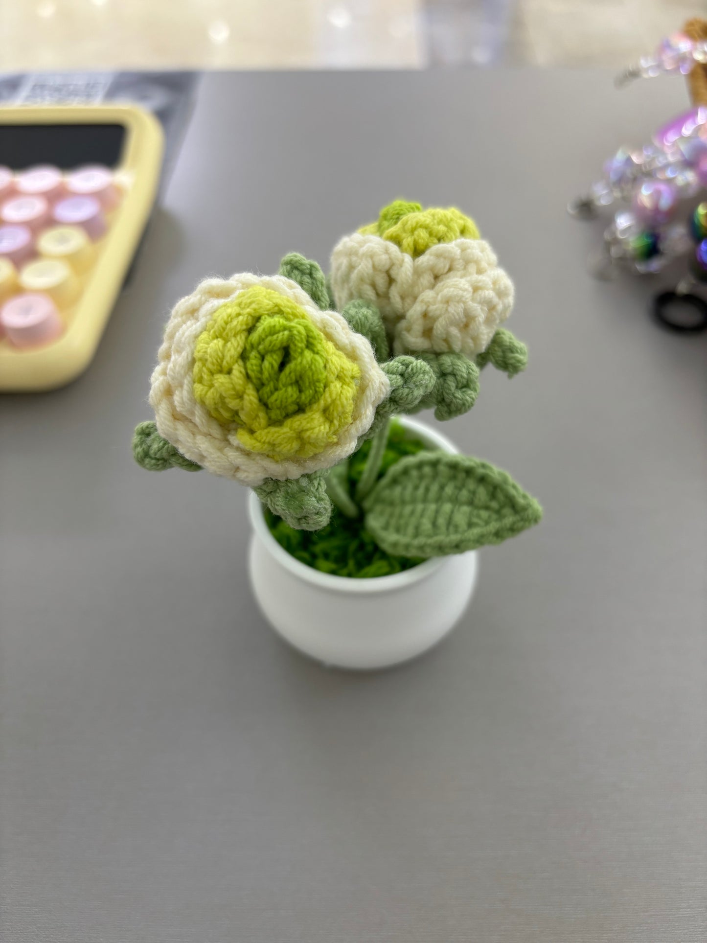 Hand-Crocheted Green and White Rosebuds in White Pot