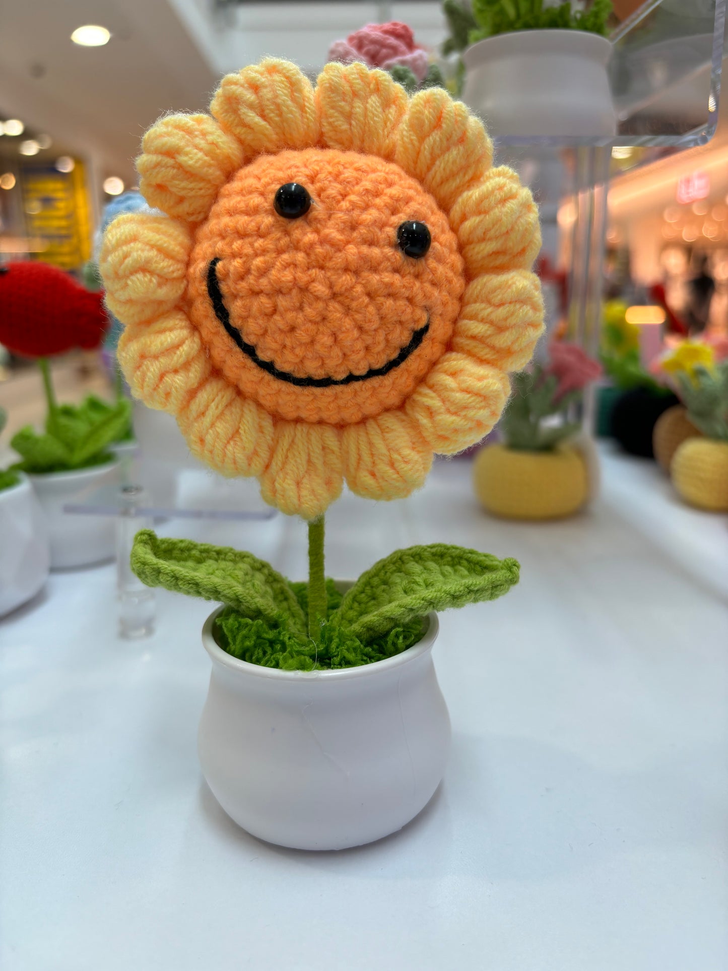 Hand-Crocheted Smiling Sunflower in Decorative Plastic Pot