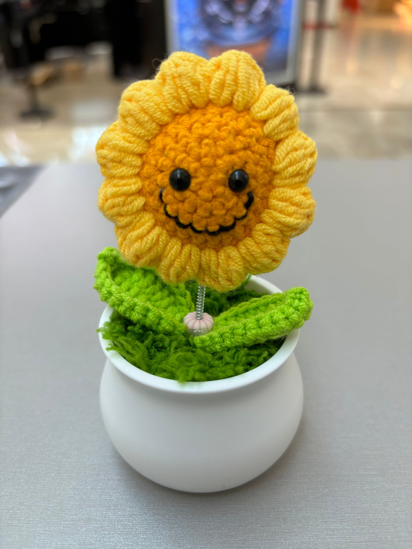Hand-Crocheted Smiling Sunflower with Spring Stem in White Pot - Wobbling Flower Amigurumi Décor