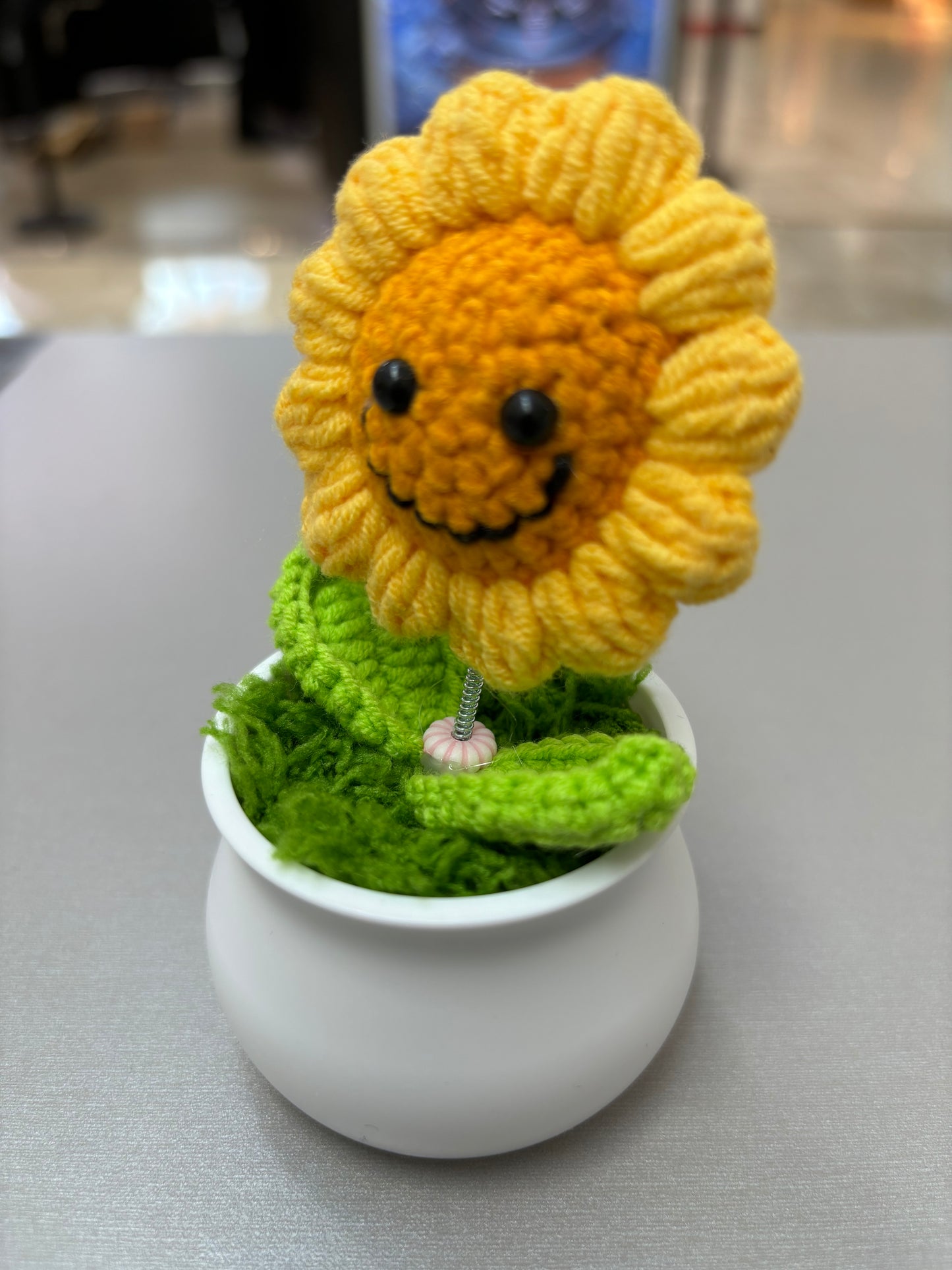Hand-Crocheted Smiling Sunflower with Spring Stem in White Pot - Wobbling Flower Amigurumi Décor