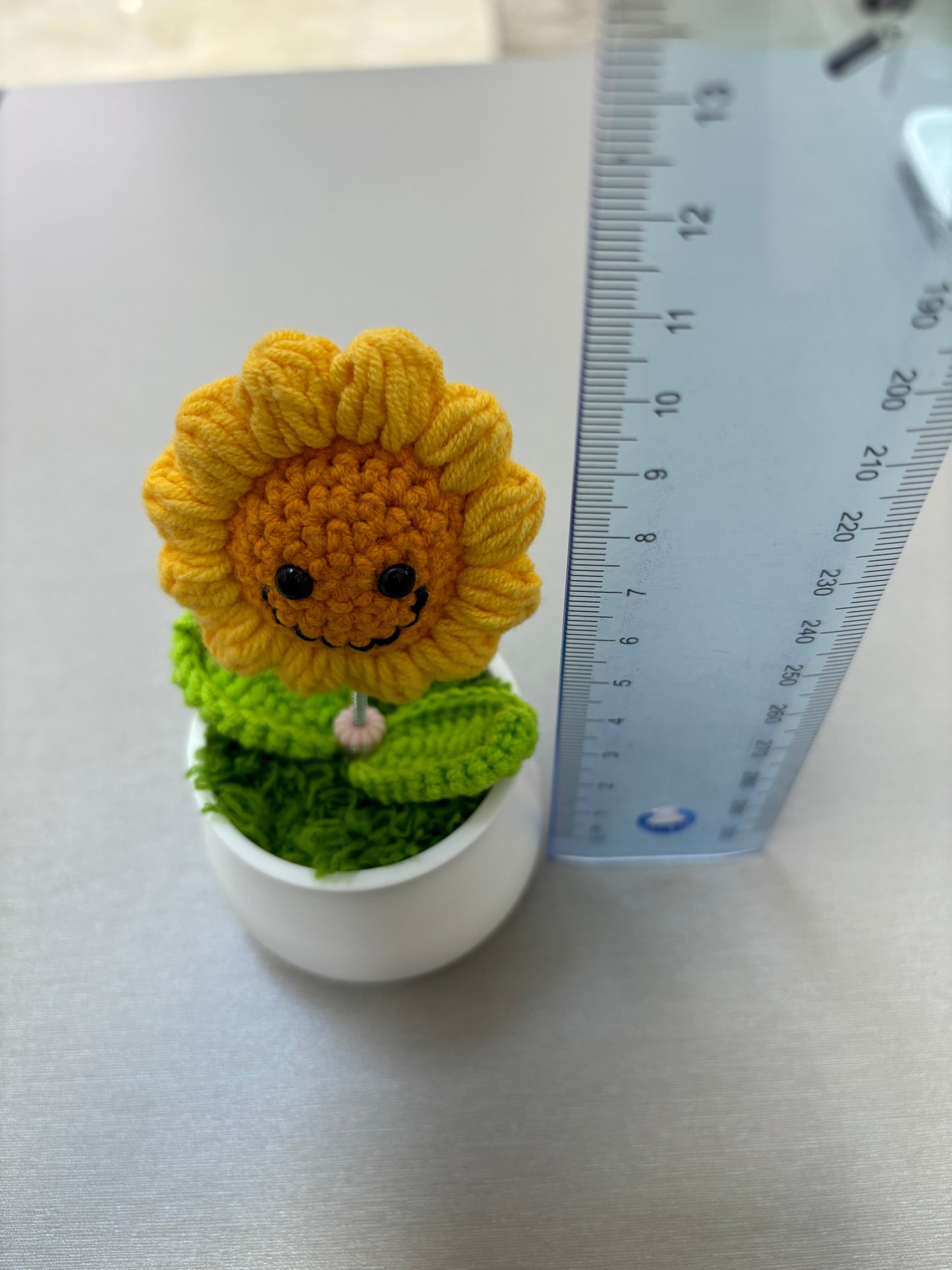 Hand-Crocheted Smiling Sunflower with Spring Stem in White Pot - Wobbling Flower Amigurumi Décor