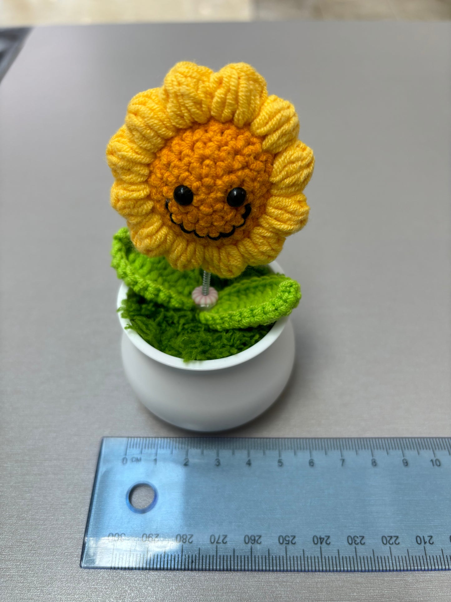 Hand-Crocheted Smiling Sunflower with Spring Stem in White Pot - Wobbling Flower Amigurumi Décor