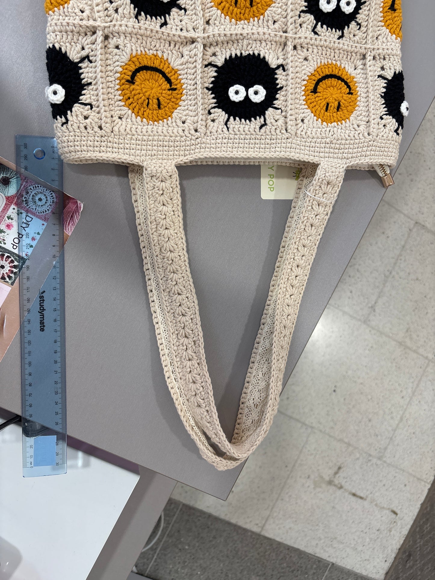 Handmade crochet bag with a charming smile pattern