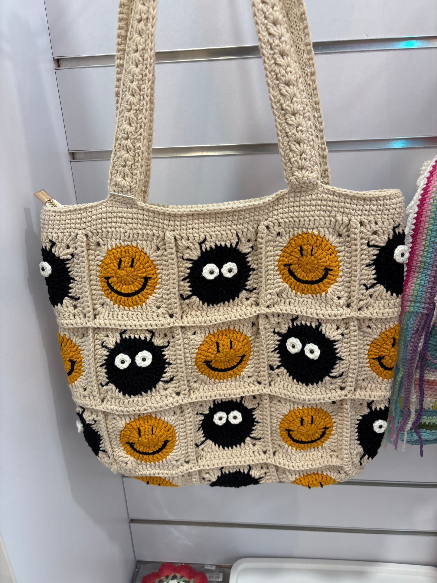 Handmade crochet bag with a charming smile pattern
