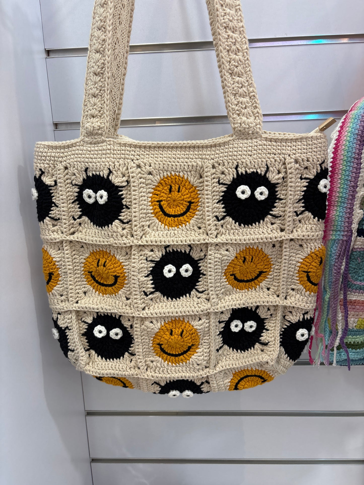 Handmade crochet bag with a charming smile pattern
