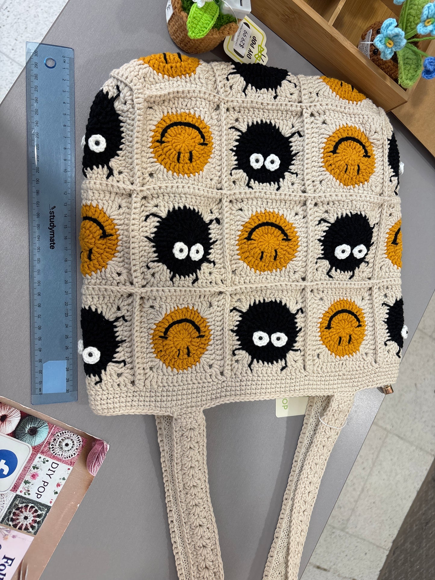 Handmade crochet bag with a charming smile pattern