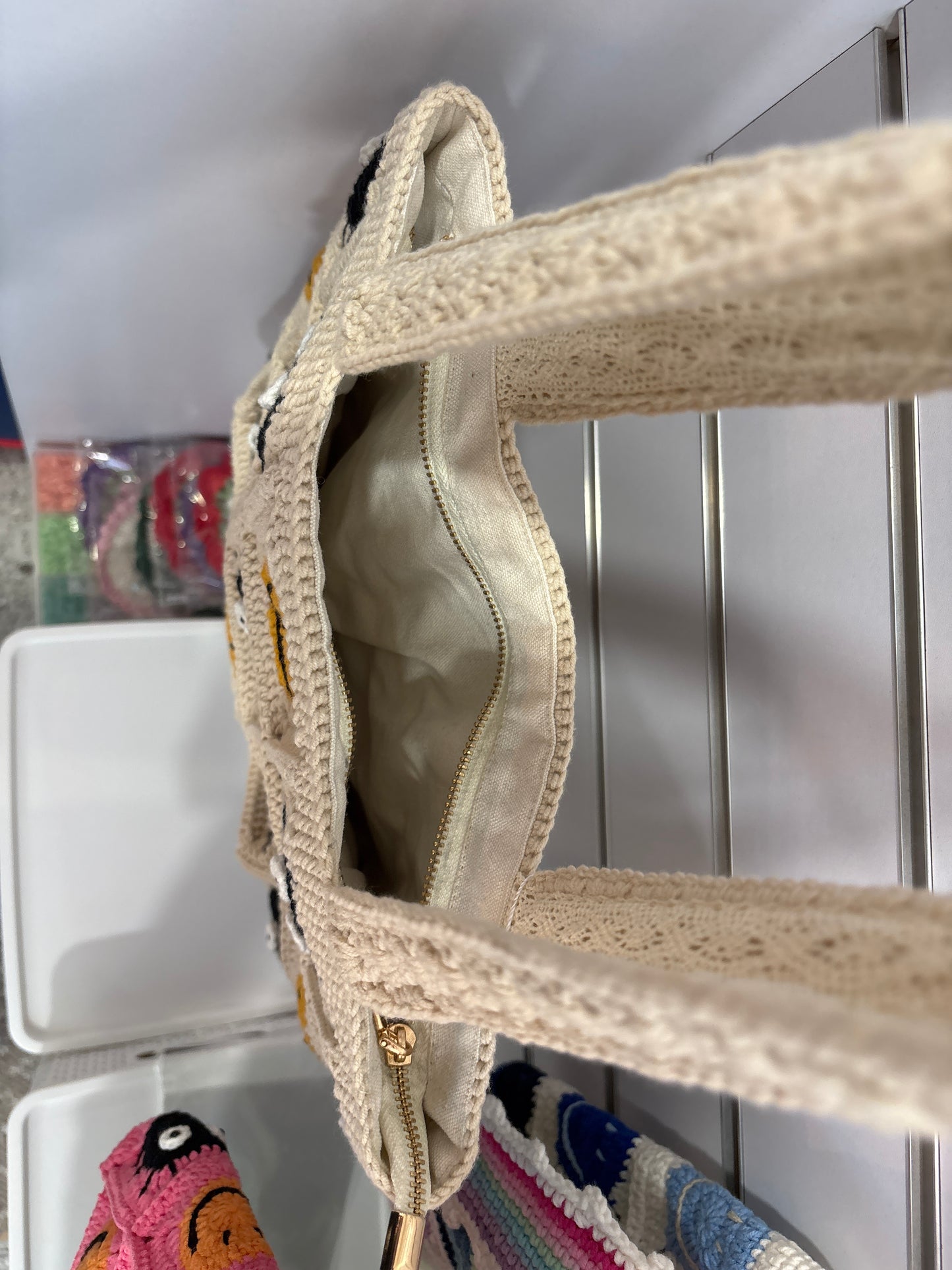 Handmade crochet bag with a charming smile pattern