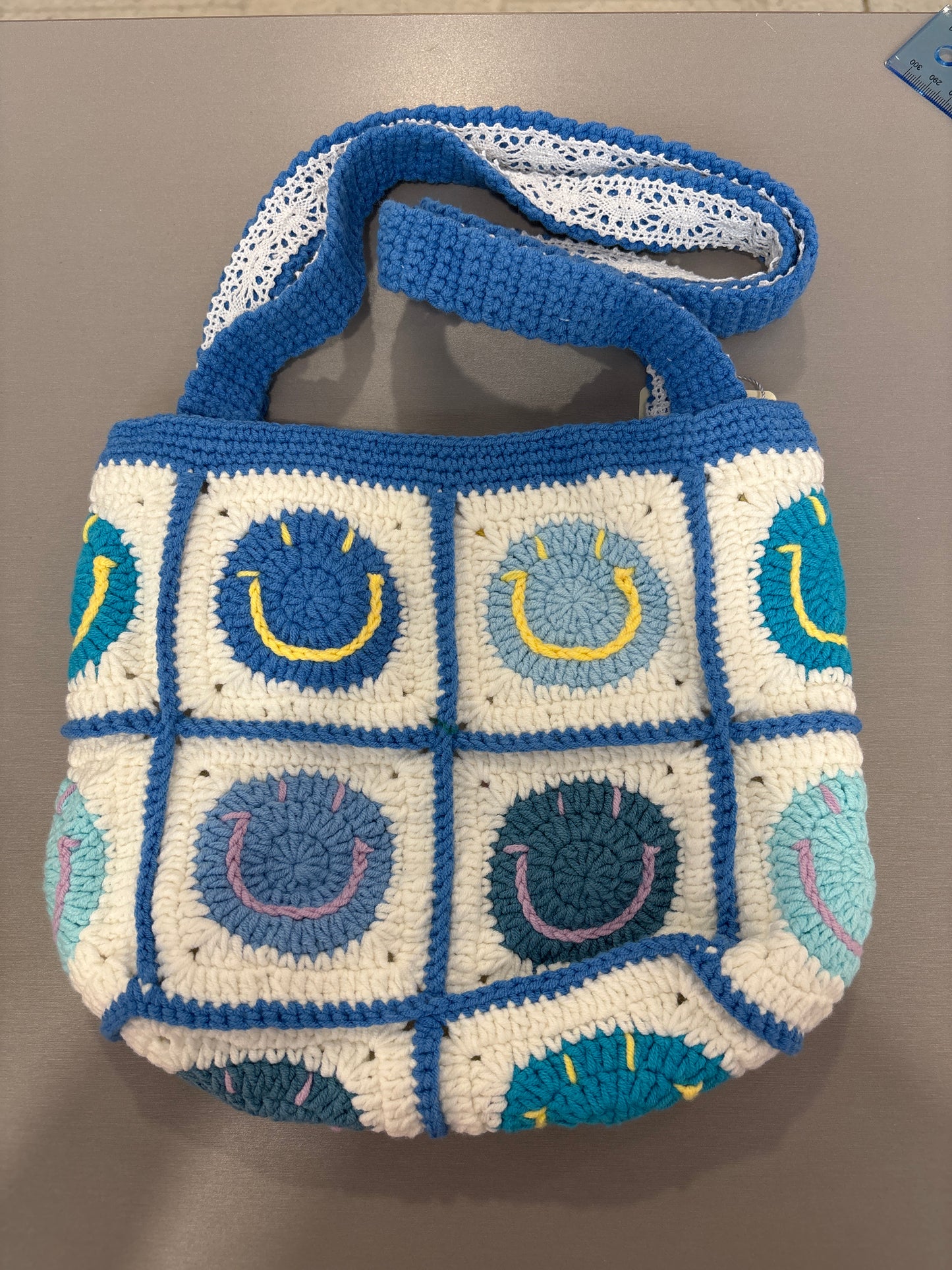 handmade crochet smile face bag