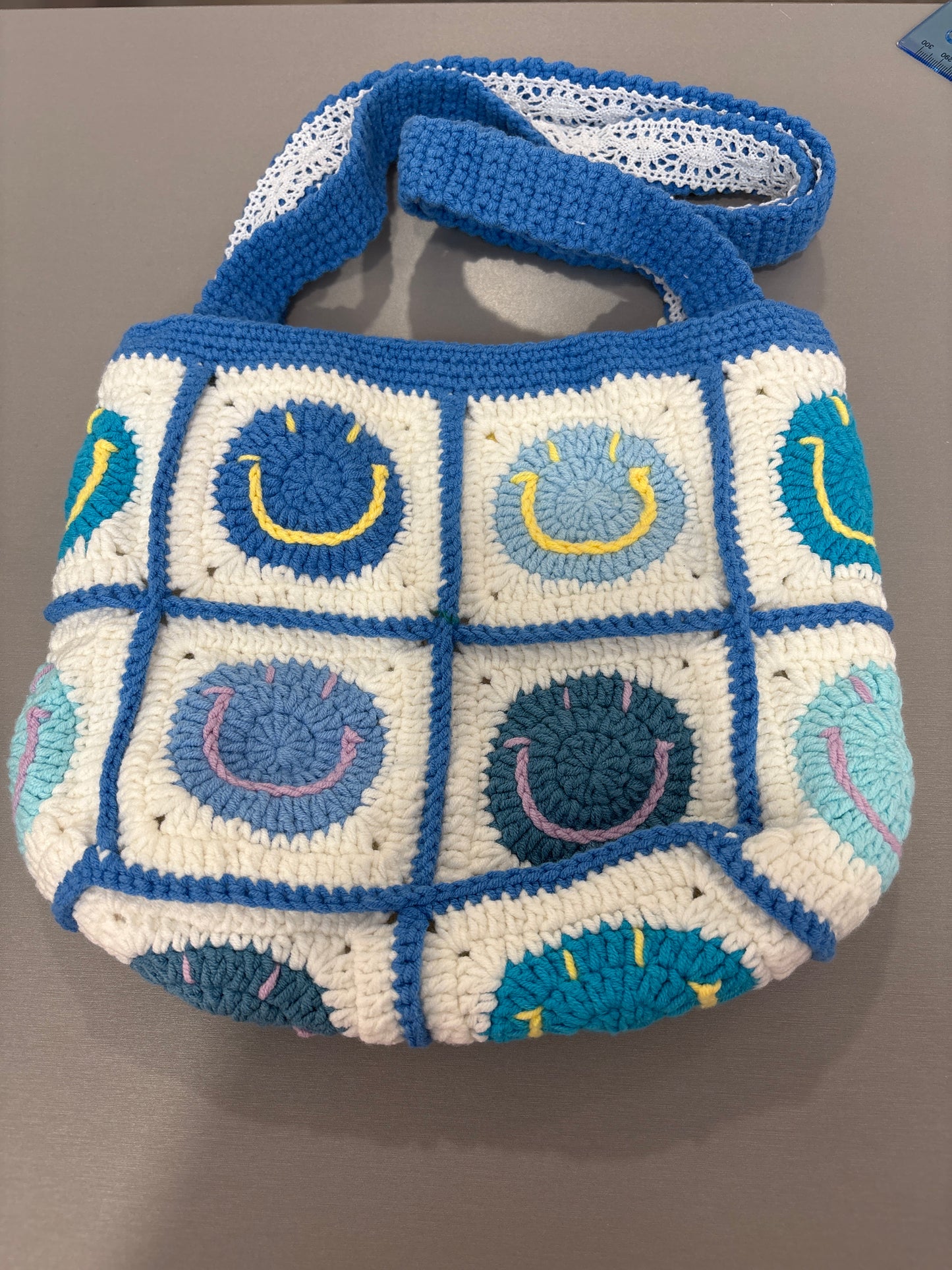 handmade crochet smile face bag